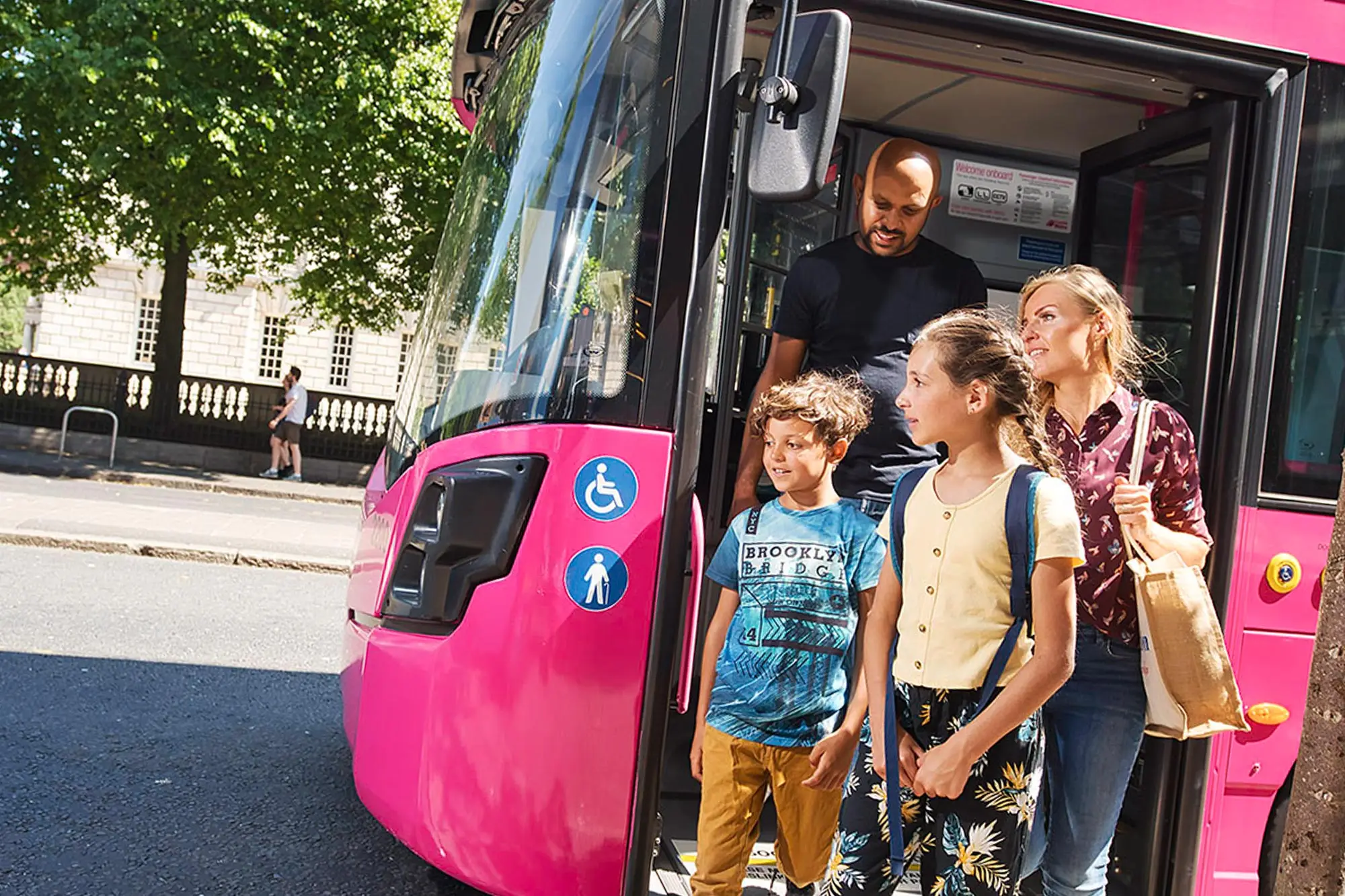 bus metro summer family A photo of a family getting off a Translink Metro bus together