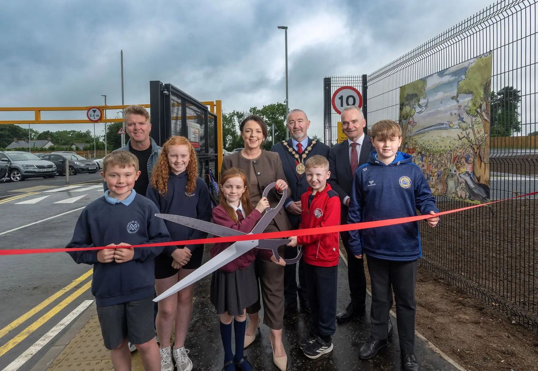 Moira P&R Completion A photograph of Translink CEO Chris Conway and Infrastructure Minister Liz Kimmins and the new Moira Park and Ride facility.